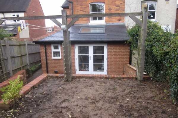 Rear view of completed extension and patio